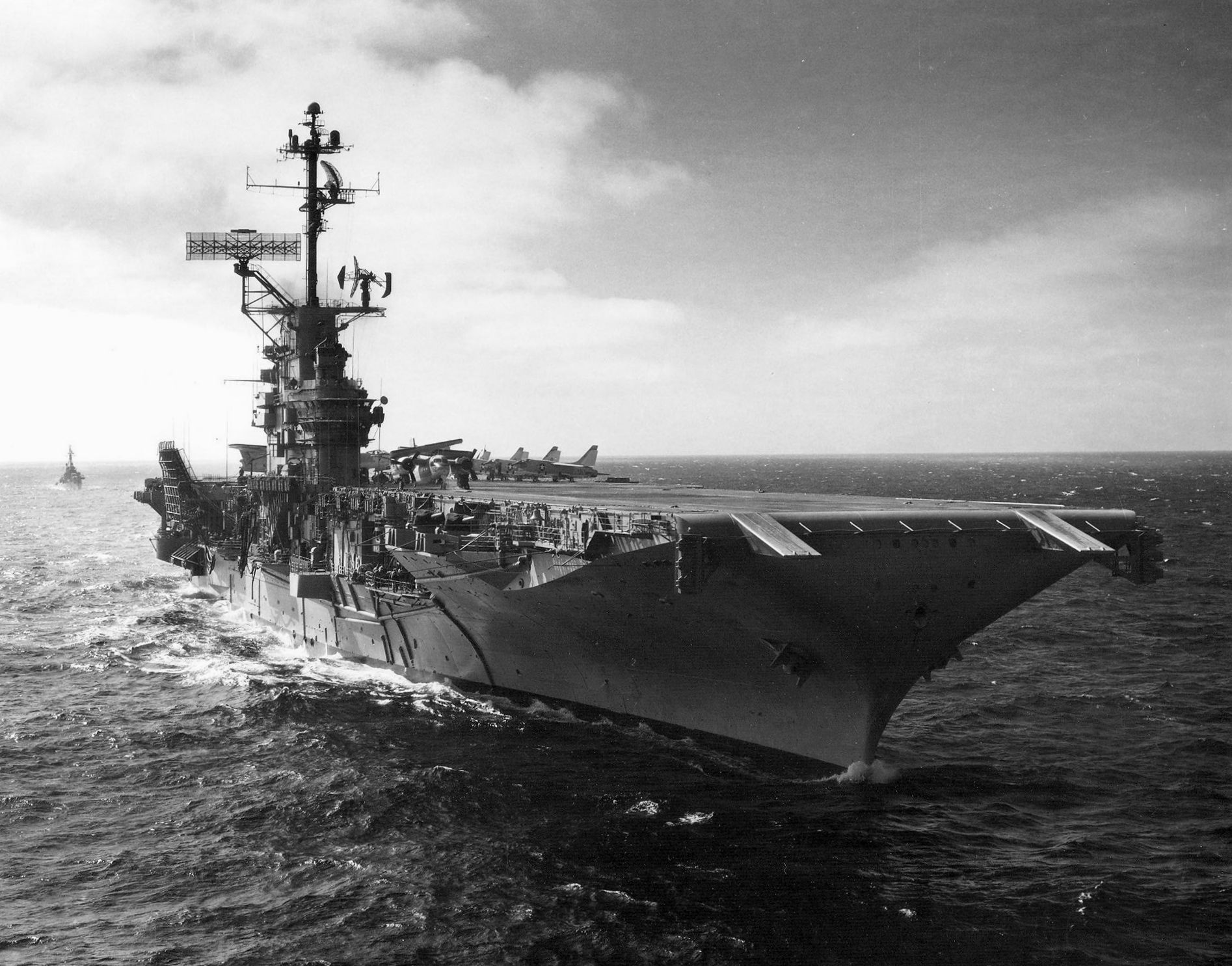 An aircraft carrier under way at sea